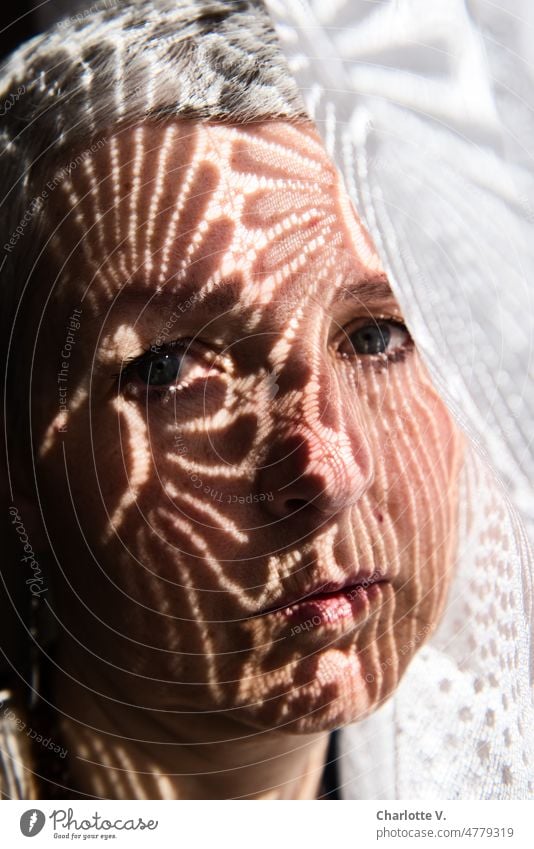 Curtain shadow on woman face | Thoughtful portrait Face of a woman portrait of a woman Woman Adults pretty Looking Looking into the camera Feminine Timeless
