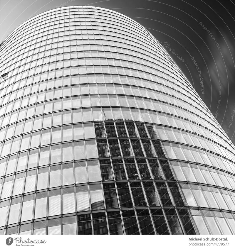 Reflection of a skyscraper in a round glass facade of a skyscraper Berlin Glass Street Light modern CENTER decoration elegance Narrow Facade Vanishing point