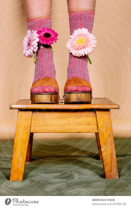 Faceless bride with colorful flowers in shoes woman wedding style occasion floral design high heels plant event elegant wooden present fragrant aroma holiday