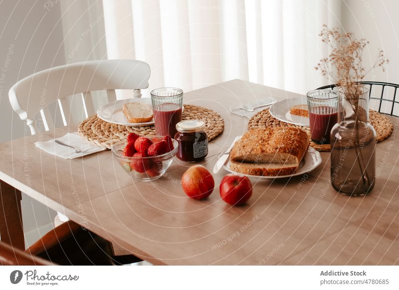 Bread with fruits on table bread strawberry apple kitchen beverage food breakfast product serve style delicious vitamin drink appetizing light ripe glass sweet