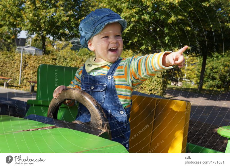Childhood | Sharing joy & enthusiasm. Human being Toddler Boy (child) Blonde jeans Overalls Denim cap Peaked cap Blue Green Orange Summer out daylight Game car