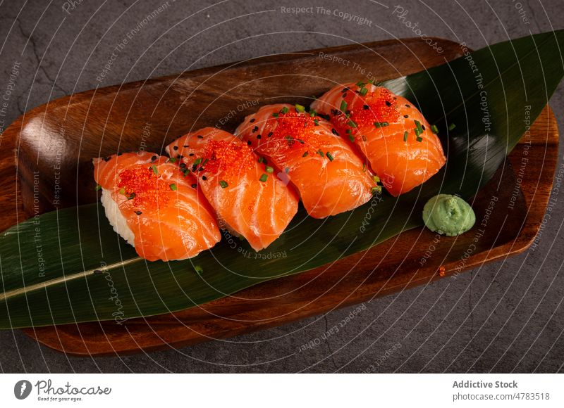 Delicious sushi with fresh salmon nigiri traditional asian food japanese seafood dish restaurant cuisine serve gastronomy palatable delectable culinary