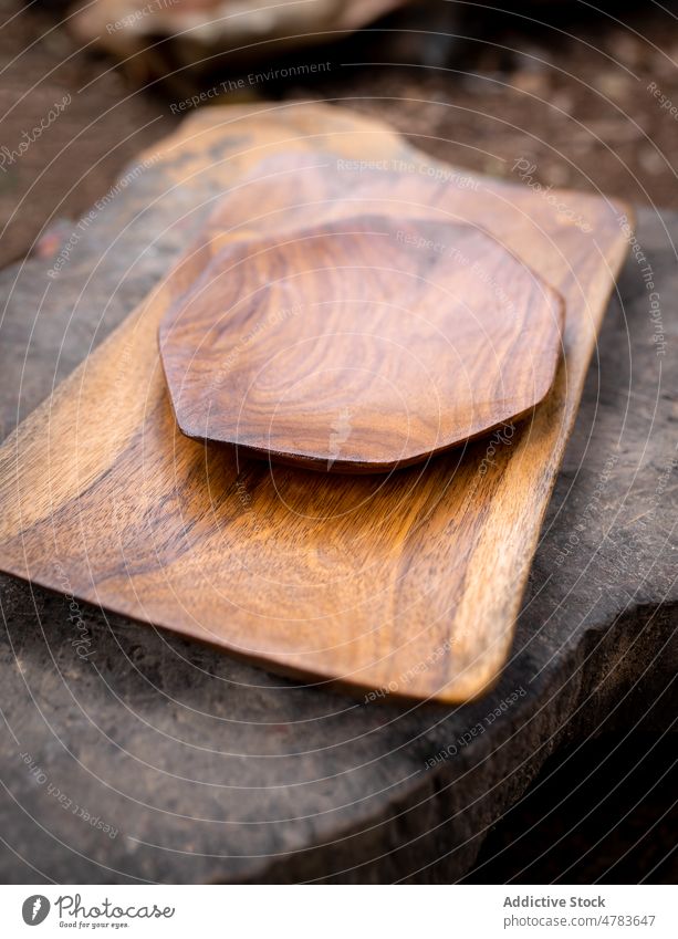Wooden plate with tray on stone wooden woodwork industry handwork countryside production handicraft style rural light summer manufacture material timber surface