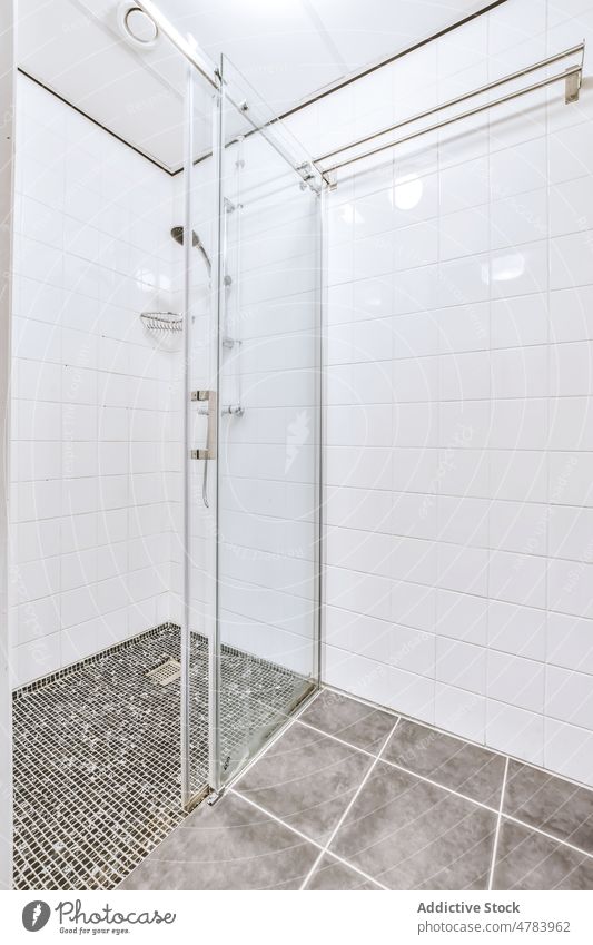 Shower cabin in bathroom shower design interior hygiene style tile private everyday apartment washroom clean minimal flat light home daily routine sanitary