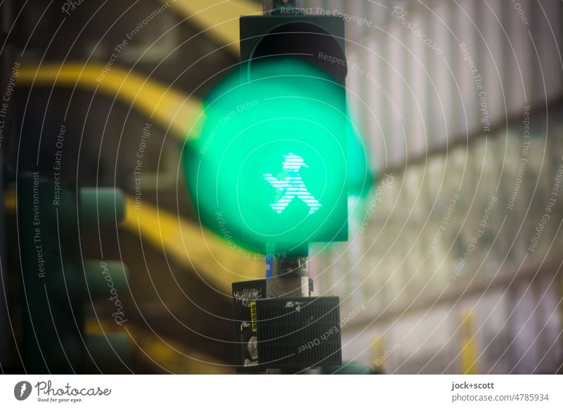 Traffic light for pedestrians now shines green Pedestrian traffic light ampelmännchen Pictogram Technology Mobility Illuminate Road sign Signal Green Silhouette
