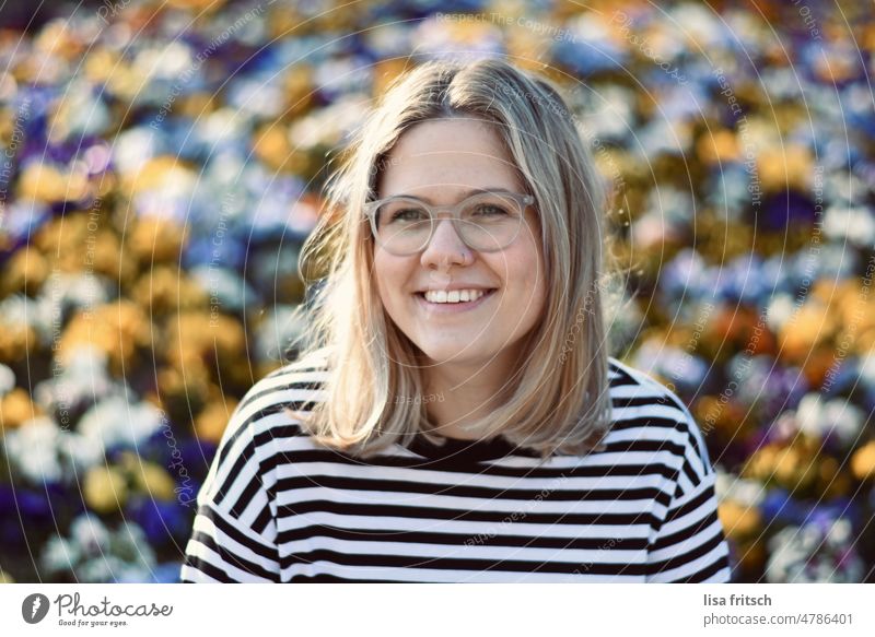 SPRING - CHEERFUL - COLORFUL Woman 25-29 years Blonde Short-haired Eyeglasses Adults Colour photo Exterior shot 20s Nose ring variegated Spring flowers