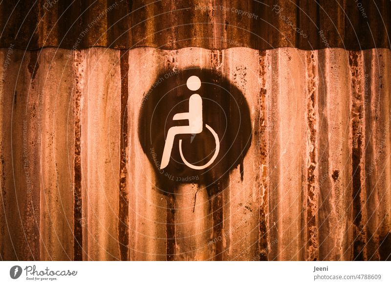 Old metal door with pictogram accessible WC LAVATORY Toilet Pictogram Public restroom Metal Corrugated sheet iron Brown Sanitary facilities Round