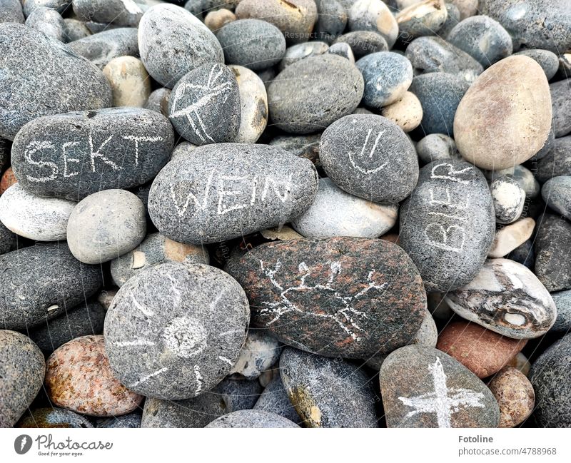 When you look for treasures on the beach, sometimes you find unexpected little messages. Stone stones Gray Brown writing Letters (alphabet) Smiley words