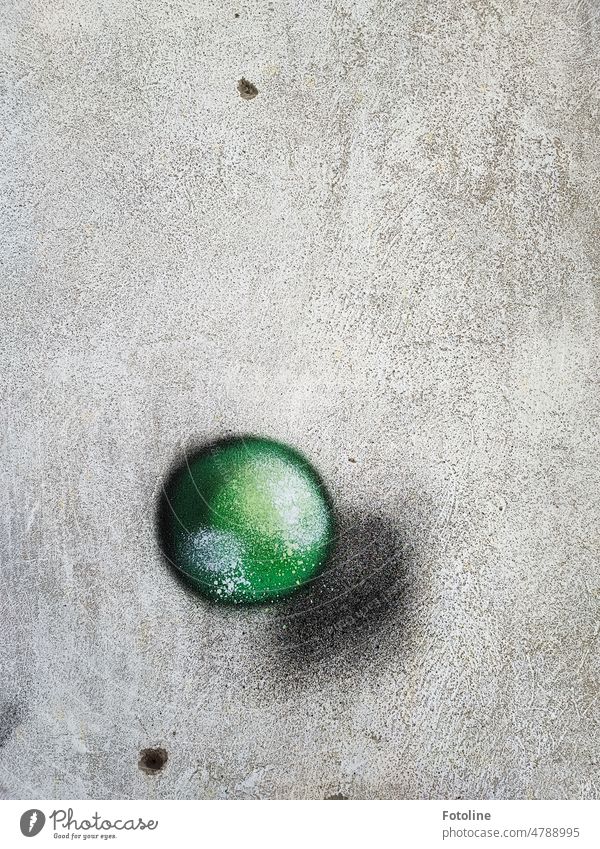 On the old wall floats a green ball that casts a shadow. Hach I like such graffiti. Graffiti Wall (building) Wall (barrier) Facade Colour photo Street art Art