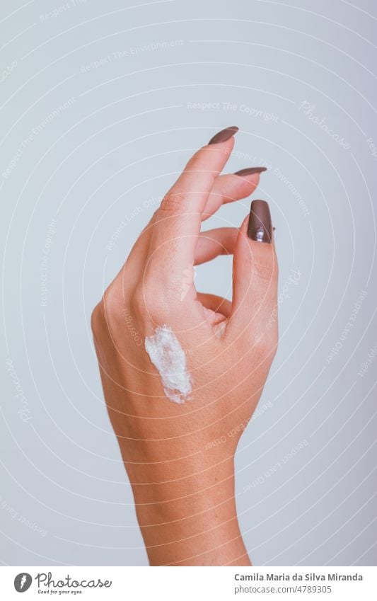 Female hand with cream. background beautiful beauty care clean close-up closeup cosmetics dermatology female girl hand cream health healthy hygiene lifestyle
