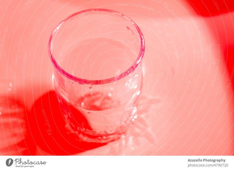 Abstract blurry red image of a glass. Red abstract background with a glass. object drink silhouette color minimalism chaos random design single colorful art
