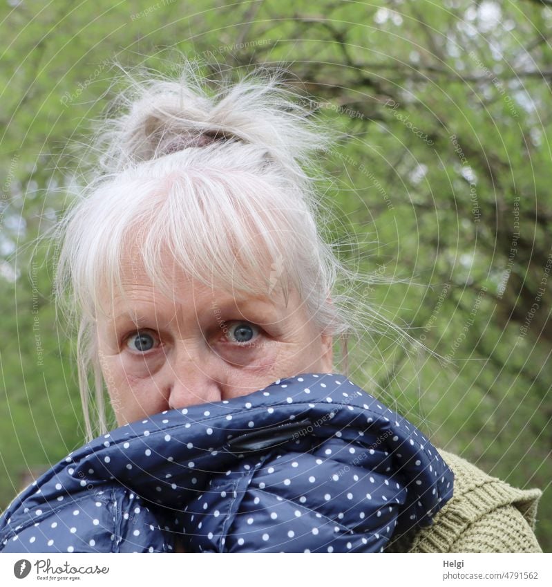 amazed look - senior woman holds her jacket in front of her face in amazement | UT Frühlingslandluft Human being Woman Senior citizen Looking Marvel Face