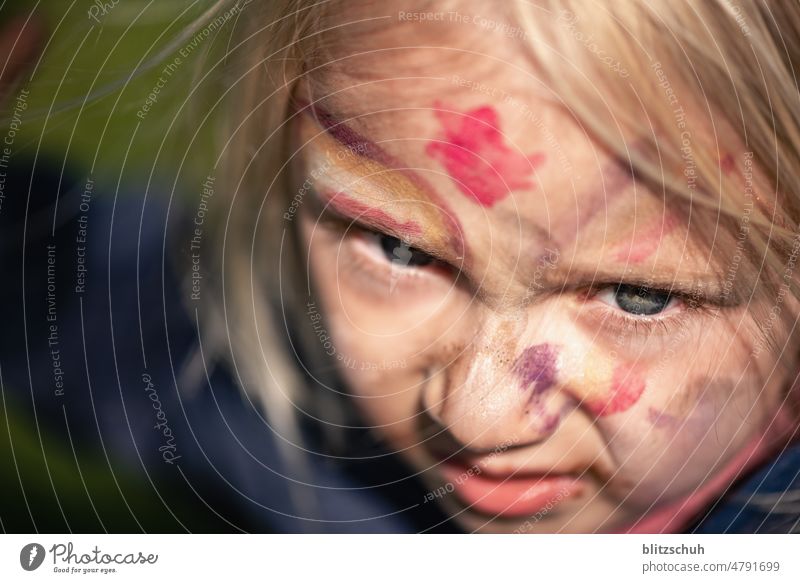 Girl with paint on face feminine Child Infancy Joy Playing cheerful Happiness Toddler Human being Cute Happy Children's game Childhood memory out