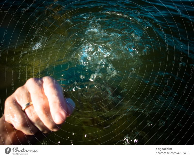 A call for help .The hand with ring, reaches out of the water and asks for help. Water Ocean Summer Nature Sun Hand Blue vacation Relaxation Drown Help Waves
