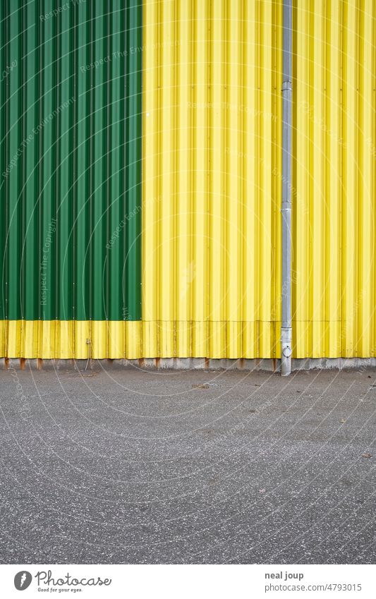 Corrugated metal facade in yellow and green Building Facade Wall (building) Corrugated sheet iron Yellow Green Background picture Structures and shapes