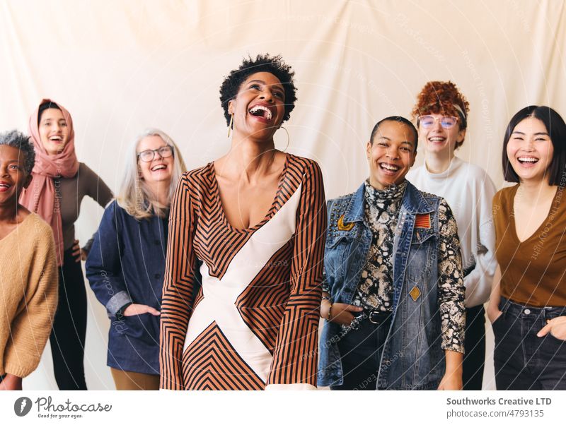 International Women's Day portrait of cheerful multi ethnic mixed age range women laughing and smiling empowerment woman group international womens day iwd
