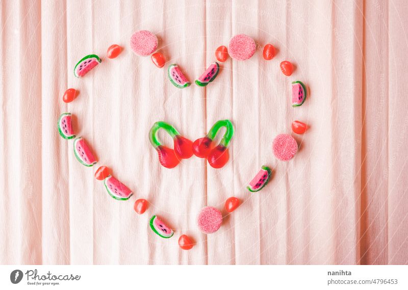 Heart shape doing with jelly beans sweet summer heart love coral temptation delicious cherry watermelon bittersweet sweet and sour pink unhealthy design tasty