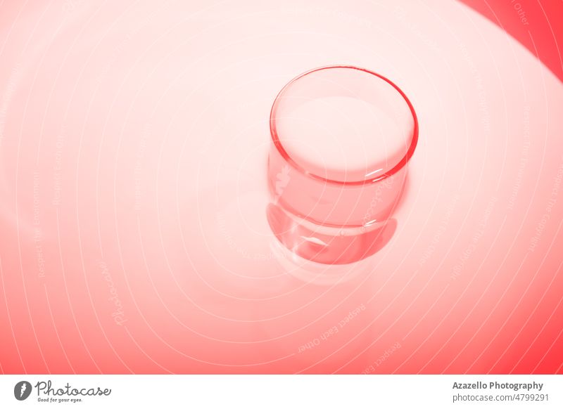 Abstract red shiny surface with a round object. Water in water. Abstract red background. abstract abstract art blue blur blurry bubble circle close up cold