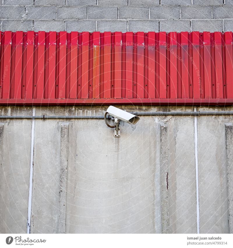 video camera on the wall security camera background street surveillance equipment safety protection technology system control guard watching secure private