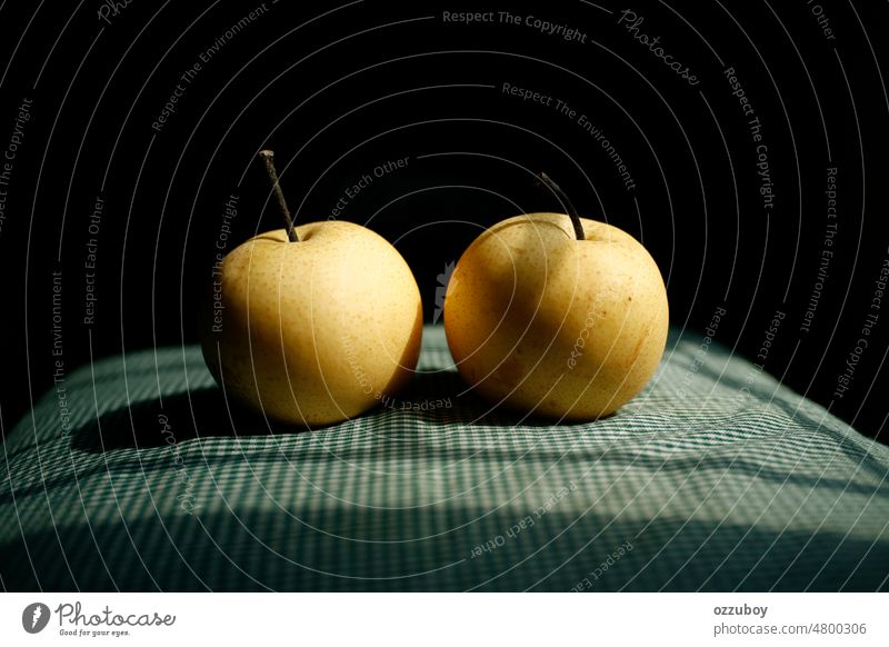 pair of pears fruit healthy yellow fresh juicy background isolated green nature sweet freshness organic two studio 2 vitamin healthy eating closeup diet