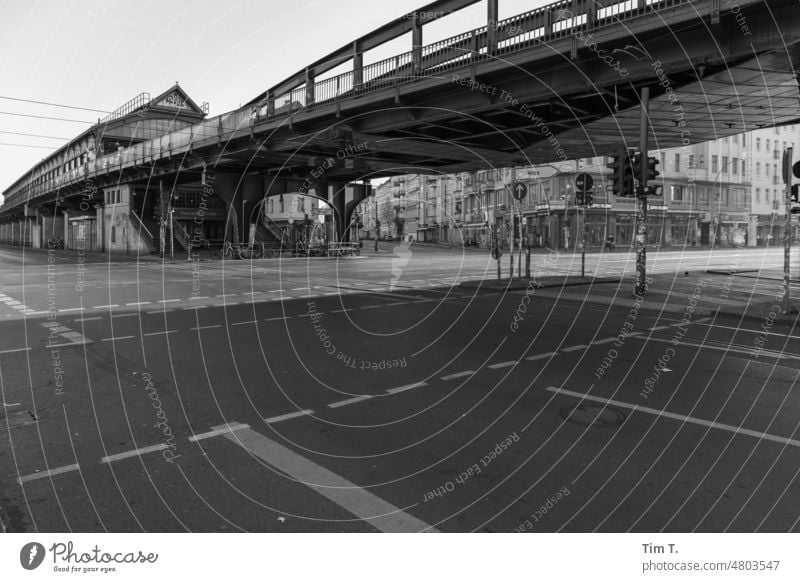 a street crossing with elevated railroad in Berlin Prenzlauer Berg bnw b/w Train station Eberswalder Street Capital city Downtown Town Exterior shot Deserted