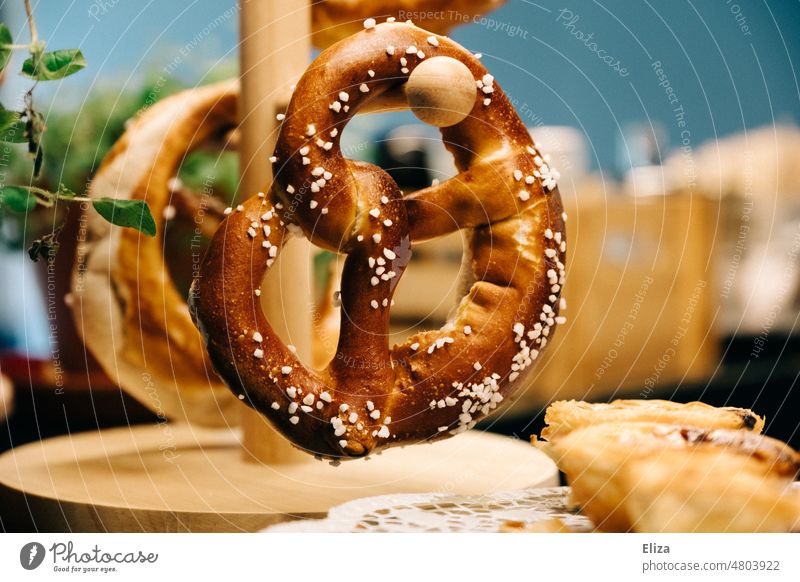 [hansa BER 2022] Pretzel on the pretzel stand biscuits Rustic Brown Pretzel stand Oktoberfest Bavarian Food Eating Snack