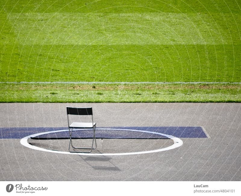 The perfect place to have a quiet ball Sporting grounds Chair Lawn Green space shot put Circle seat Grass Playing field Football pitch Grass surface Ball sports