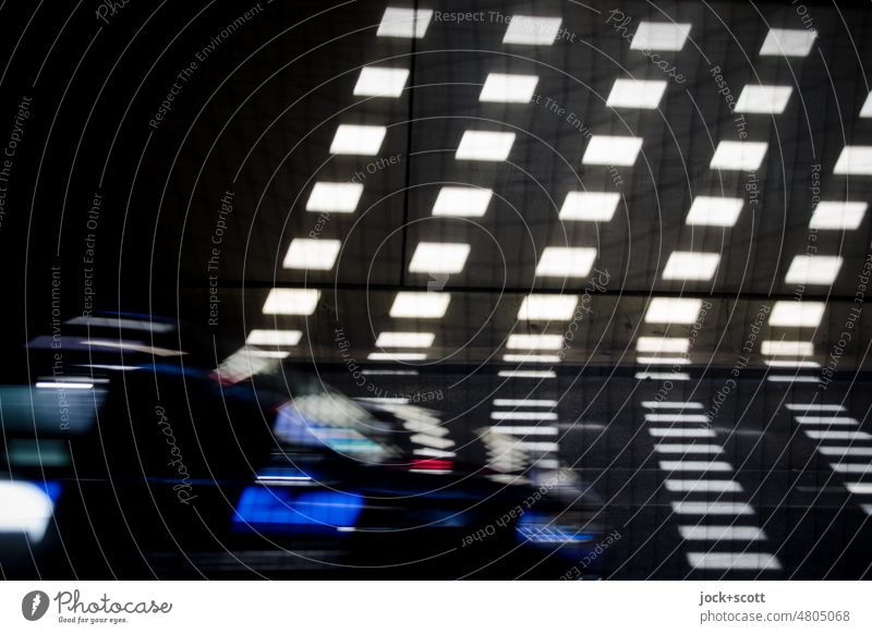 New mobility in the play of light Tunnel Mobility car Means of transport Traffic infrastructure Car Driving motion blur Street Strip of light Architecture