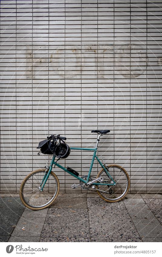 Bicycle in front of wall with photo book remains in Hansa district [Hansa BER 2022]. Historic Buildings Vacation & Travel Beautiful weather Tourism City trip
