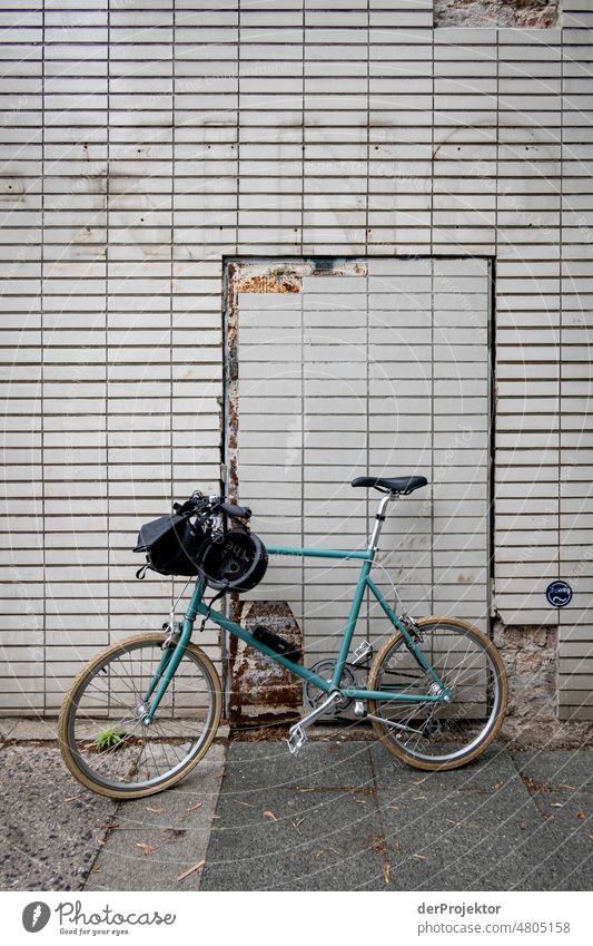 Bicycle in front of wall with cinema letter remains in Hansa district [Hansa BER 2022]. Historic Buildings Vacation & Travel Beautiful weather Tourism City trip