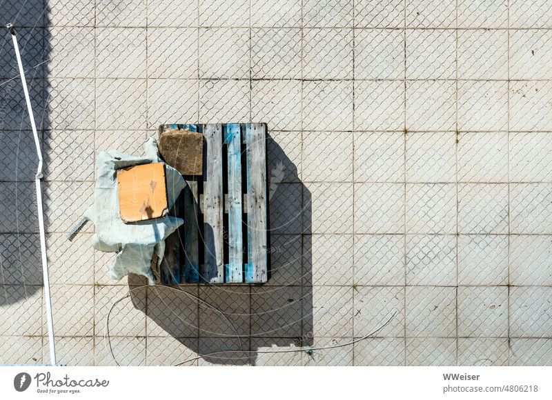 Top view of tiled terrace or balcony with few puzzling objects lines from on high sight Balcony boards Terrace pallet Broken Chair tiles Shadow Light Sun