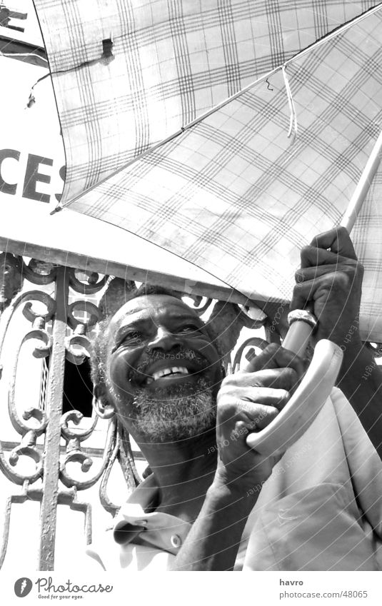 Miracle of Bonfim Grinning man black umbrella church black person Black & white photo texture