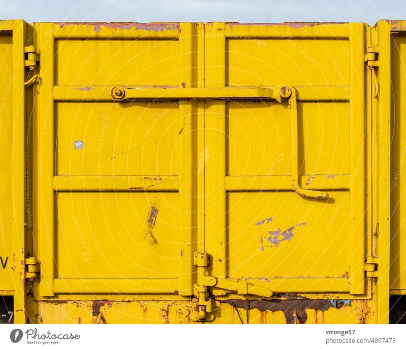 Door of yellow railroad car Railroad car railcar Yellow yellow wagon Transport Rail transport Logistics Colour photo Exterior shot Day Deserted Close-up detail