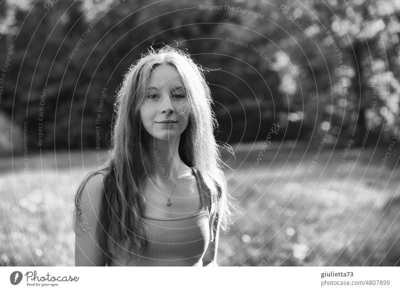 Summer black and white portrait of long haired teenage girl in park Black & white photo Afternoon sun Long-haired Young woman Youth (Young adults) Exterior shot