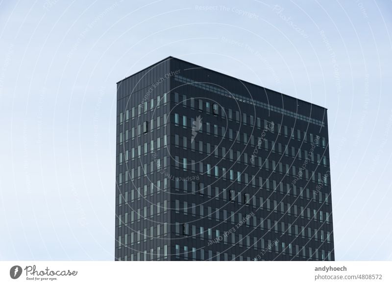 Minimalist modern high-rise building with clear blue sky architectural architecture black block Business city cityscape concept construction copy space design