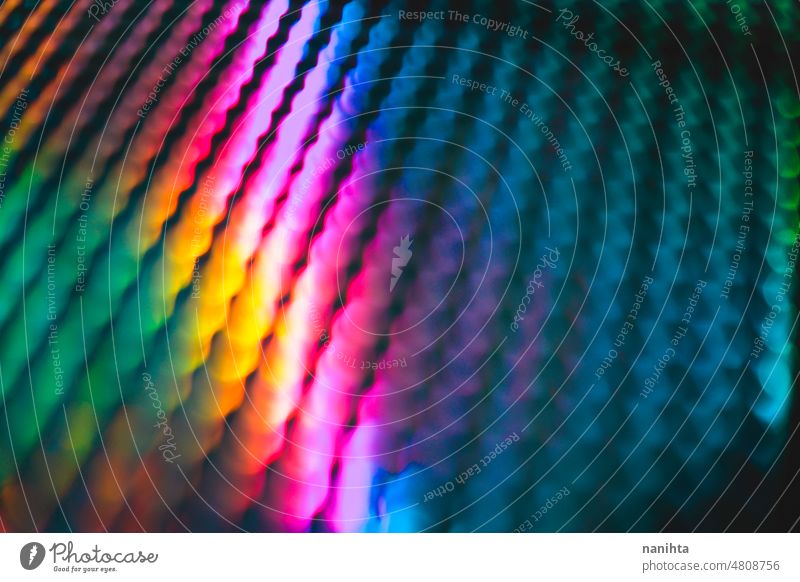 Abstract and pattern background in intense rainbow light colors neon bokeh colorful digital lines abstract fluor iridiscent multi colored shapes led energy