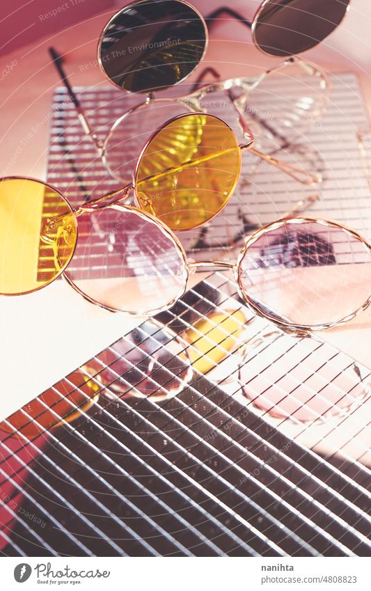 Fresh collection of summer trendy sunglasses fashion pink product still life mirror retro vintage reflection studio group yellow style golden stylish