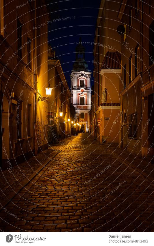 Evening mood in a cobbled lane of an old European city Night Light Light and shadow Cobblestones cobbled street Historic Historic Buildings Dark Moody Poznan