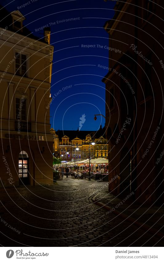 Old city square at night viewed from the shadows Night Light Light and shadow Cobblestones cobbled street Historic Historic Buildings Dark Moody Europe European