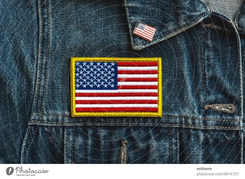Happy Independence day July 4th. American flag textile patch on a denim jacket and American pin independence day usa united states america american july 4th