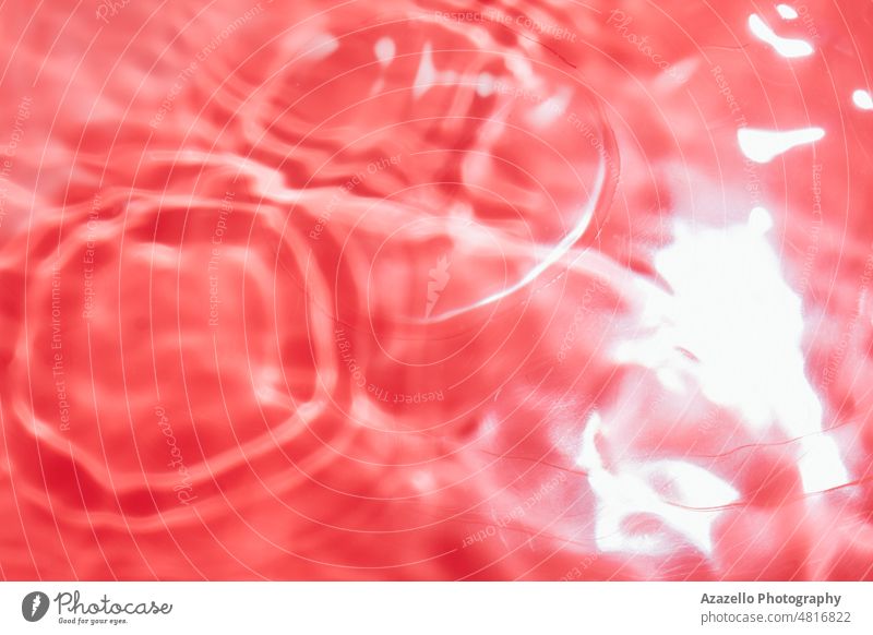 Red abstract background in blur. Blurry liquid surface with ripples. abstract art backdrop blood bubble chaos chaotic close up color colorful creativity crimson