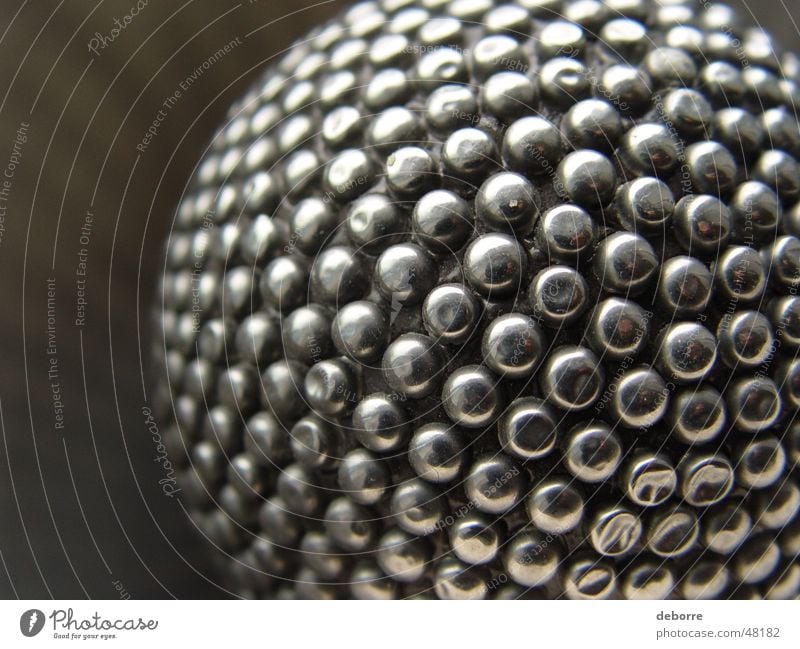 Metal orb reflecting light inside a metal bowl. Disco ball Round Globe light Burl Glittering Steel High-grade steel Light Gray Sphere Ball Silver