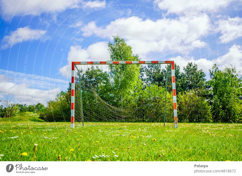 Old handball goal with a broken net tactics nobody dandelions pitch old yard metal mini goal training kids texture home target movable upcountry family fun