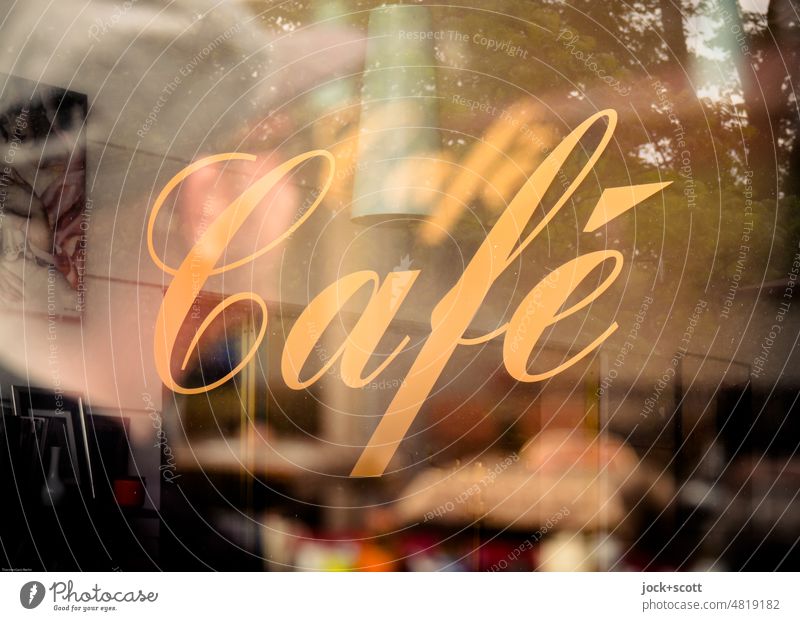 [hansa BER 2022] visiting a café is doubly worthwhile Café Gastronomy Double exposure Word Typography Characters Pane Old fashioned Squiggly golden Man
