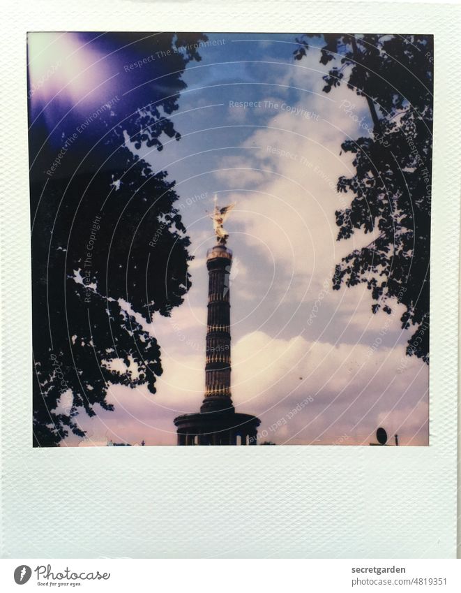 [hansa BER 2022] The victory column has the view to the Lightleak Polaroid Victory column Berlin Frame unclean Sky Clouds Vista Monument Capital city Landmark