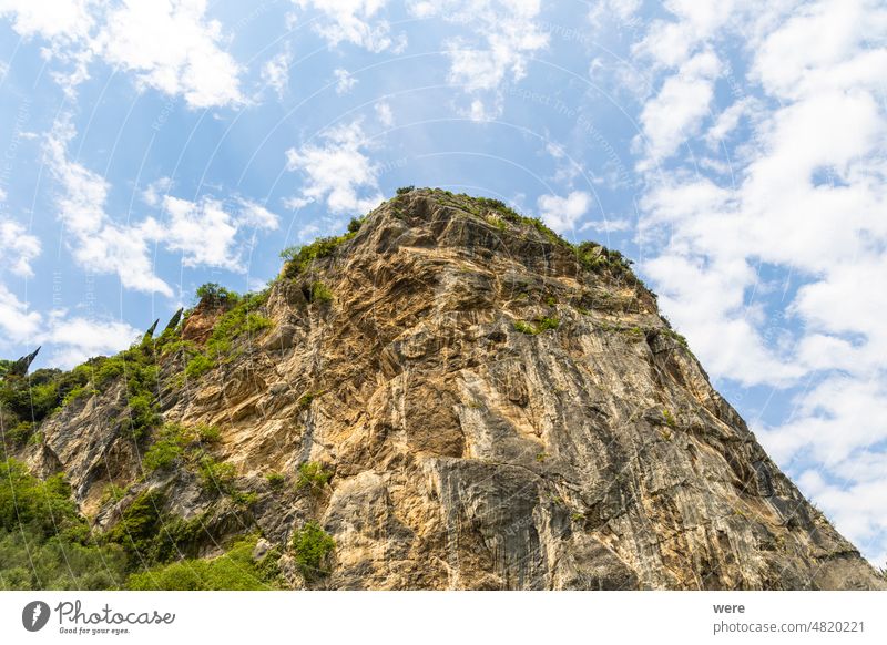 rocky mountains near Arco at Lake Garda in Italy with blue sky and light white clouds Holiday copy space italy landscape nature nobody scenery scenic travel