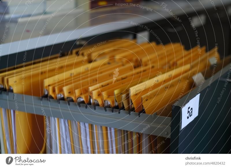 Filing cabinet with hanging file files Student File Rack secretary School Abitur dislocation Expulsion from school kick Asylum Ukraine Fugitives SchoolCorona