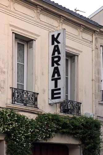 karate Karate Advertising sign Neon sign publicity advertising sign Billboard writing typo typography Letters (alphabet) Facade House (Residential Structure)
