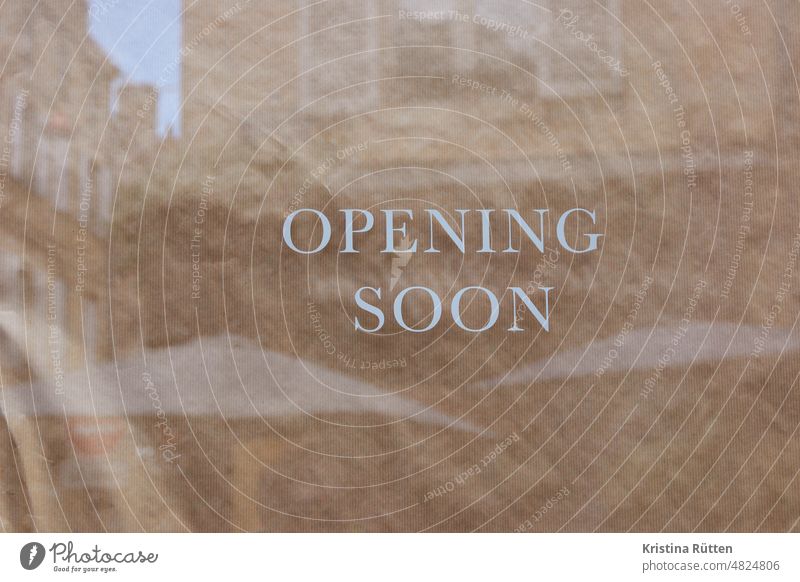 opening soon Opening reopening Text writing info Clue Shop window Window Window pane pasted up masked Load business shop reflection Wrapping paper Mysterious