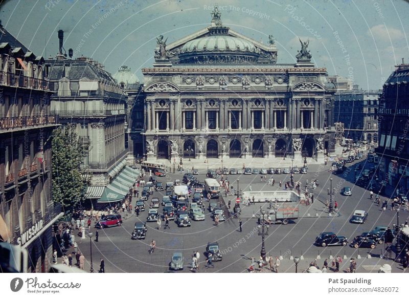 An Exquisite View from the Outside of the Opera Garnier in Paris France Beautiful Architecture Travel Tourism Vintage Vintage Cars Cityscape 1950's